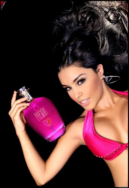 woman holding a pink bottle