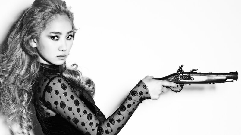 woman holding a pistol