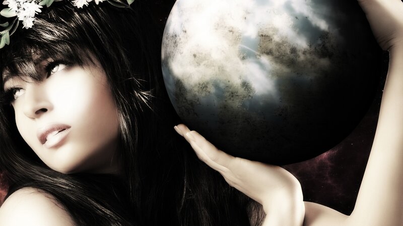 woman holding a planet