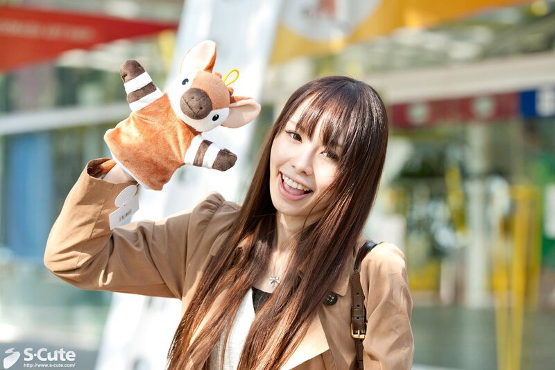 Woman holding a plush toy