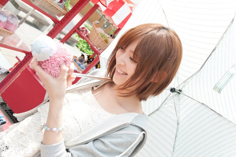woman holding a plush toy