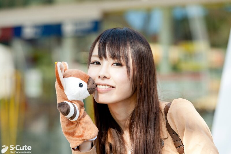 Woman holding a plush toy