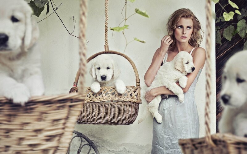 Woman holding a puppy