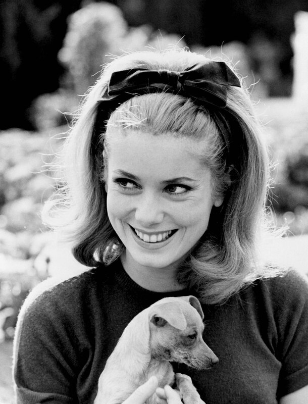 Woman holding a puppy