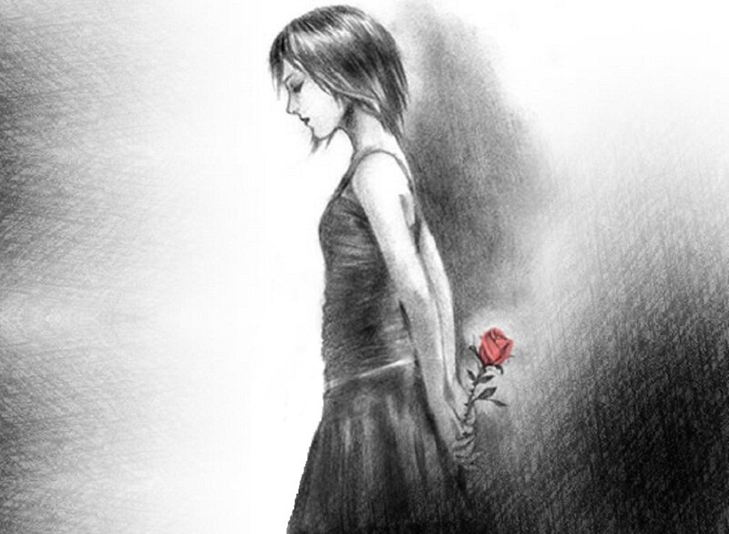 woman holding a red rose
