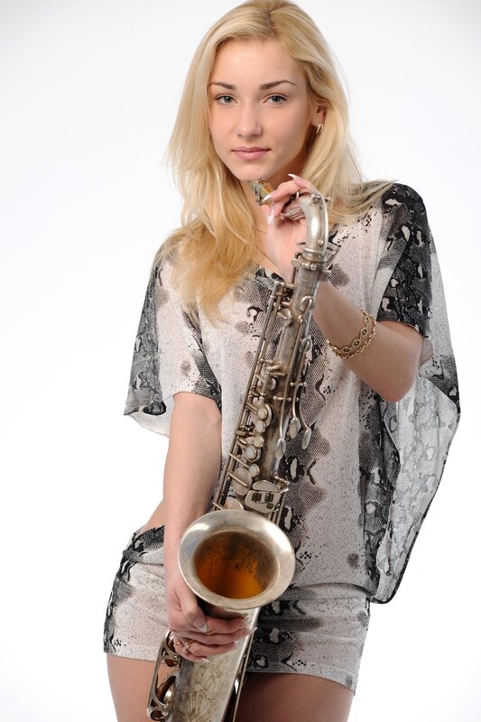 Woman holding a saxophone