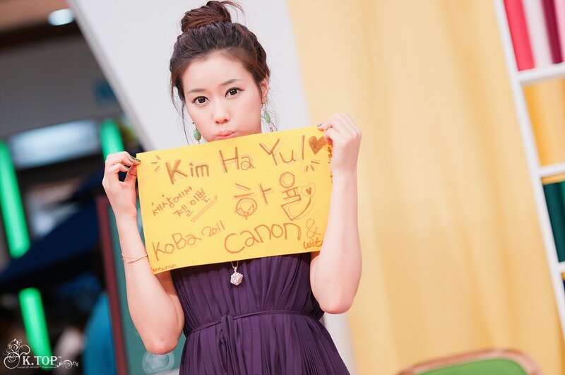 woman holding a sign