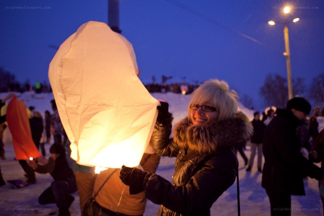 Woman holding a sky lantern
