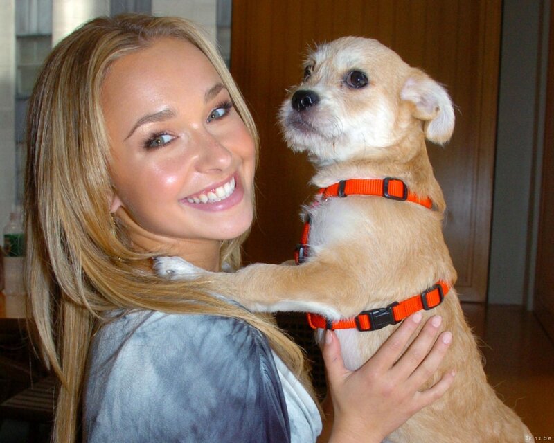 Woman holding a small dog
