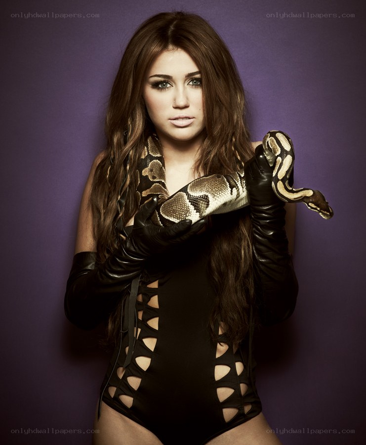 woman holding a snake