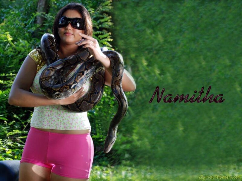Woman Holding a Snake — Green