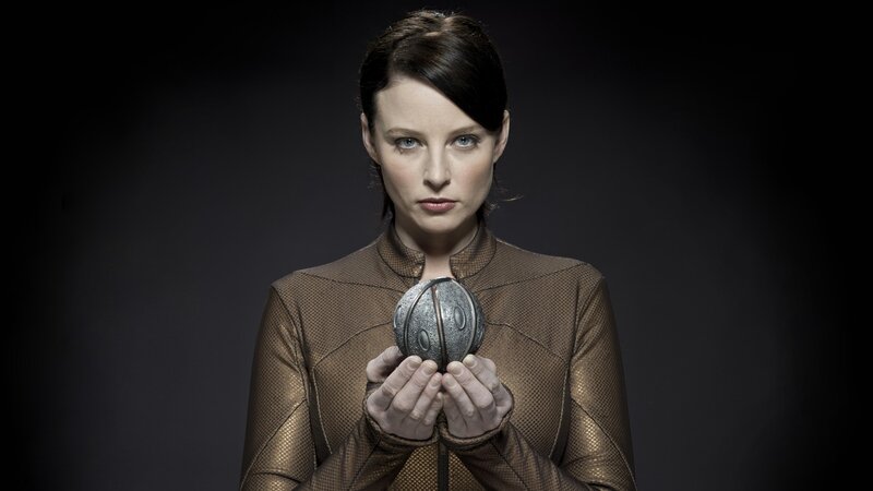 Woman holding a sphere
