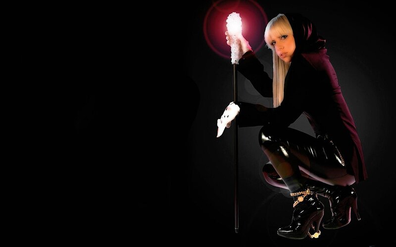 Woman Holding a Staff — Black, Dramatic, Night