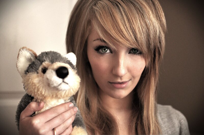 Woman holding a stuffed animal