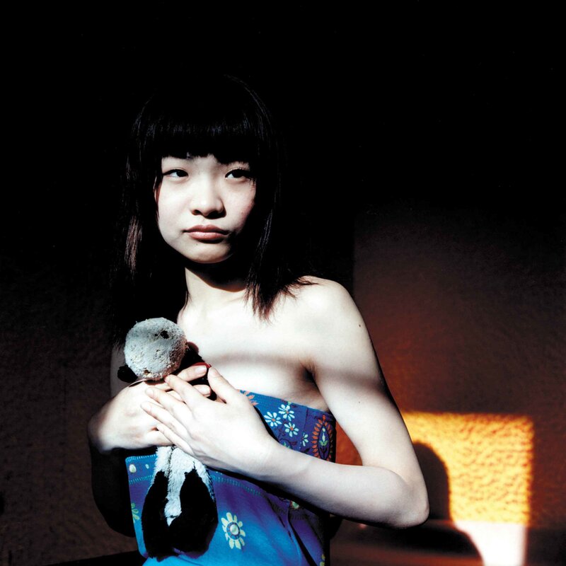 woman holding a stuffed animal