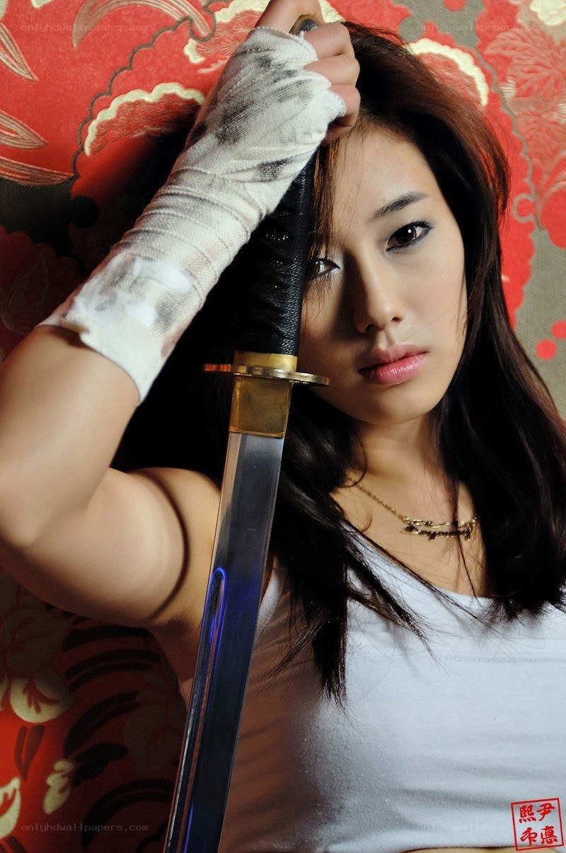 woman holding a sword