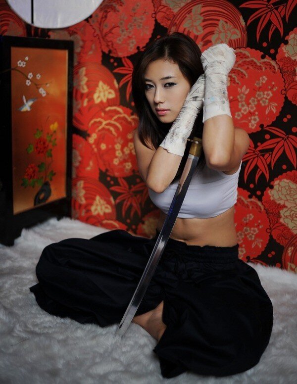 woman holding a sword