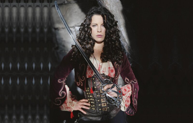 Woman Holding a Sword — Black, Dramatic, Photograph, Corset