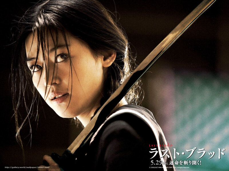 Woman Holding a Sword — Black, Dramatic, Photograph, Hair