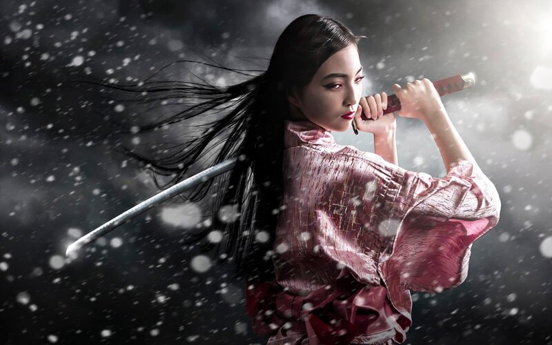 Woman Holding a Sword — Black, Dramatic, Winter