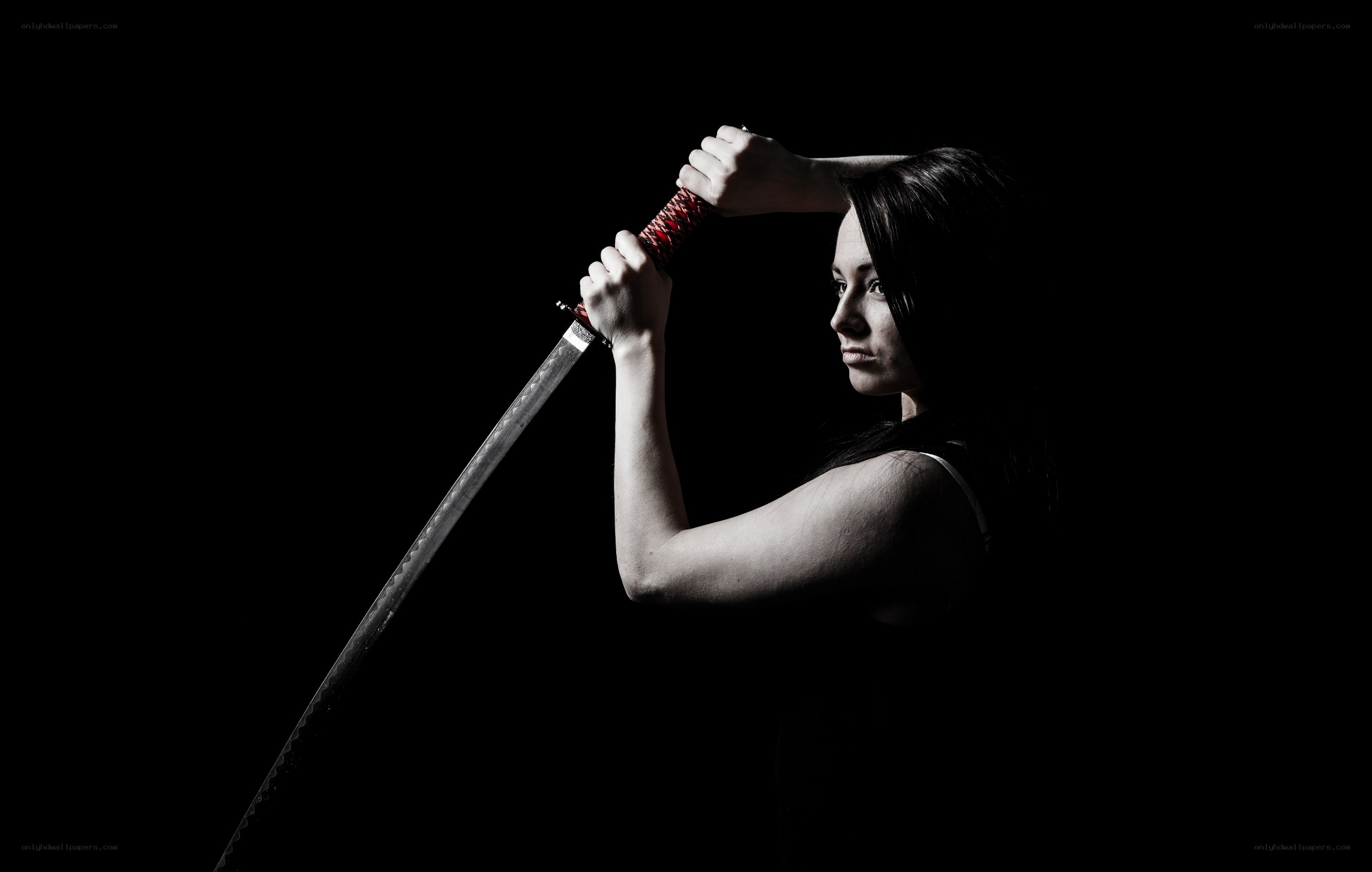 woman holding a sword