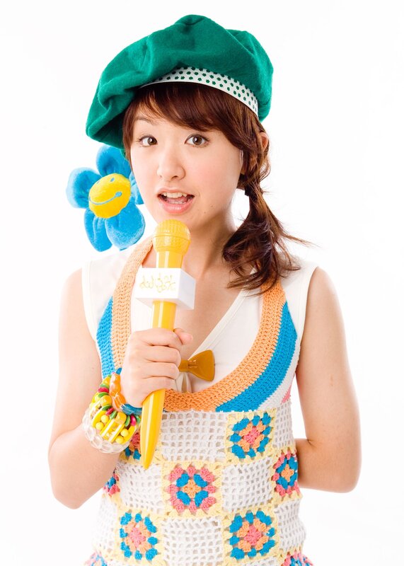 woman holding a toy microphone