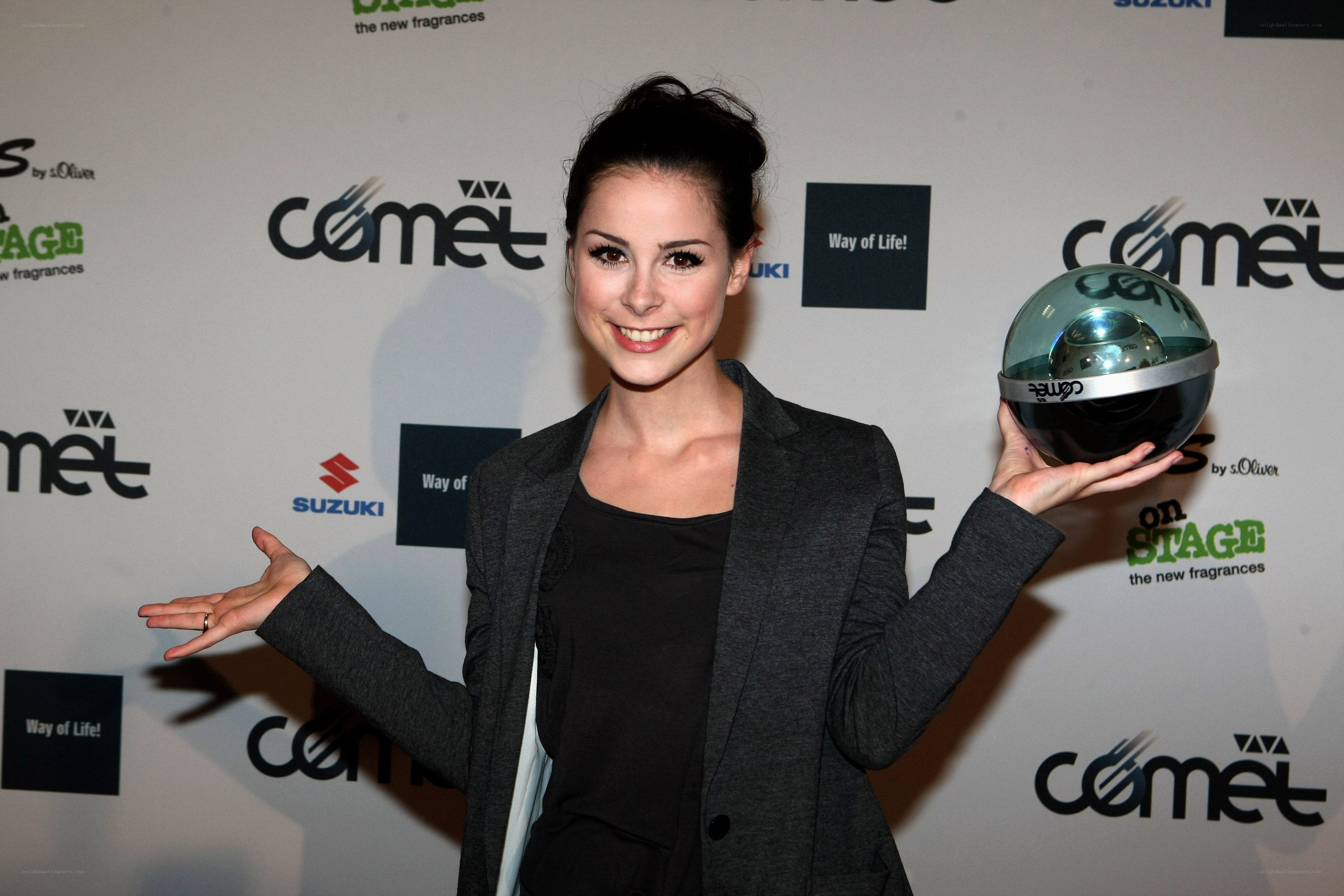 woman holding a trophy