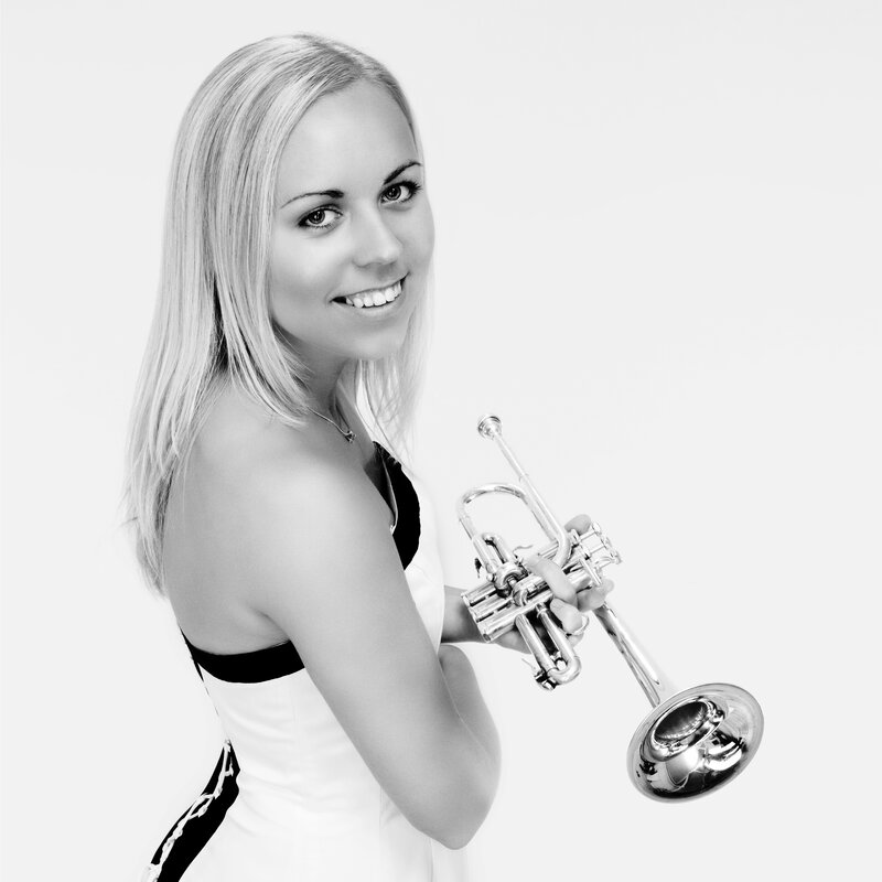Woman holding a trumpet