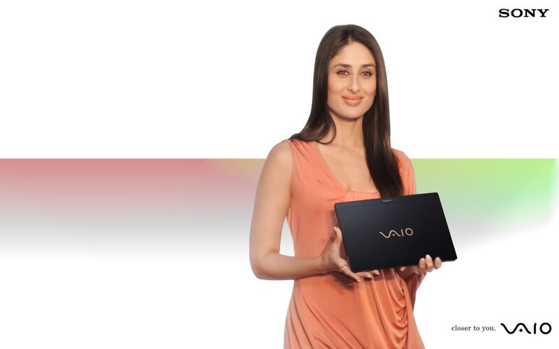 woman holding a vaio laptop