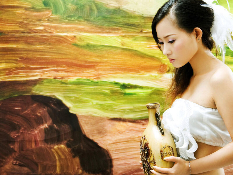 Woman Holding a Vase — White