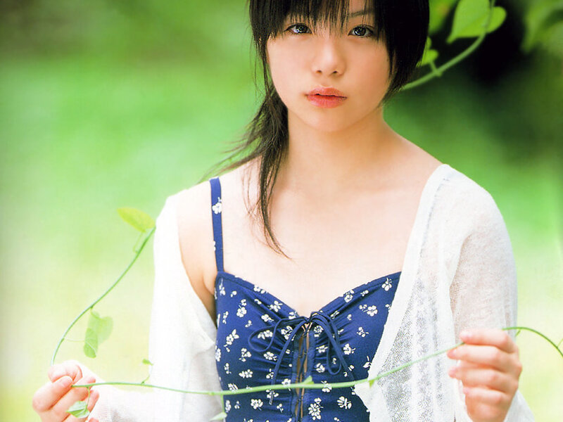 woman holding a vine in nature