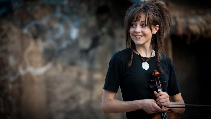 woman holding a violin