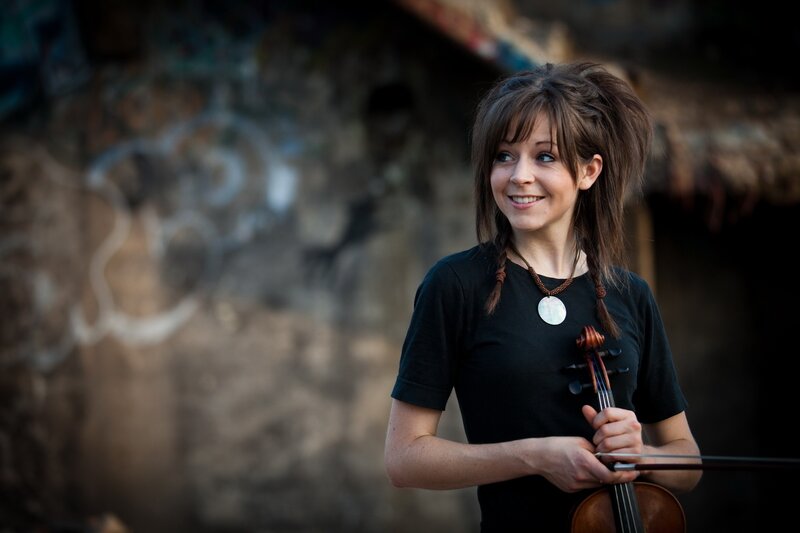 woman holding a violin