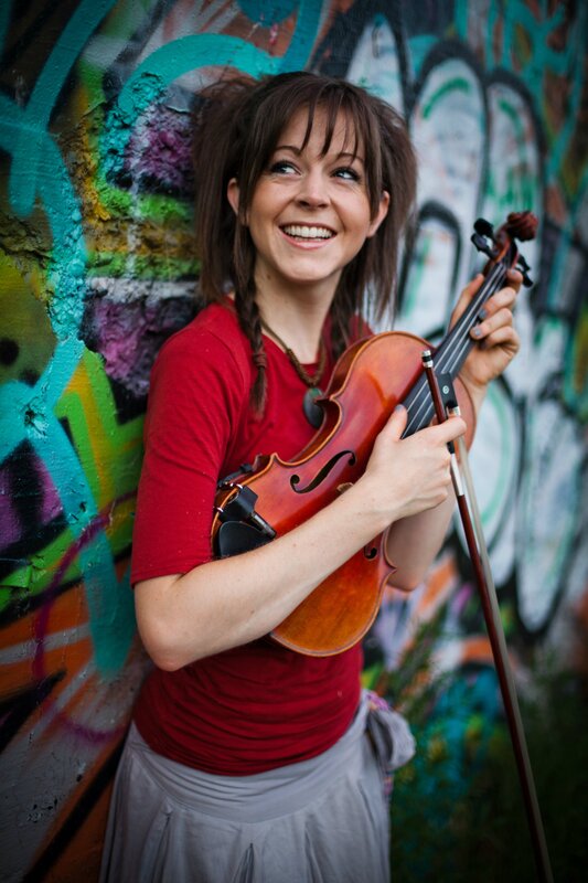 woman holding a violin