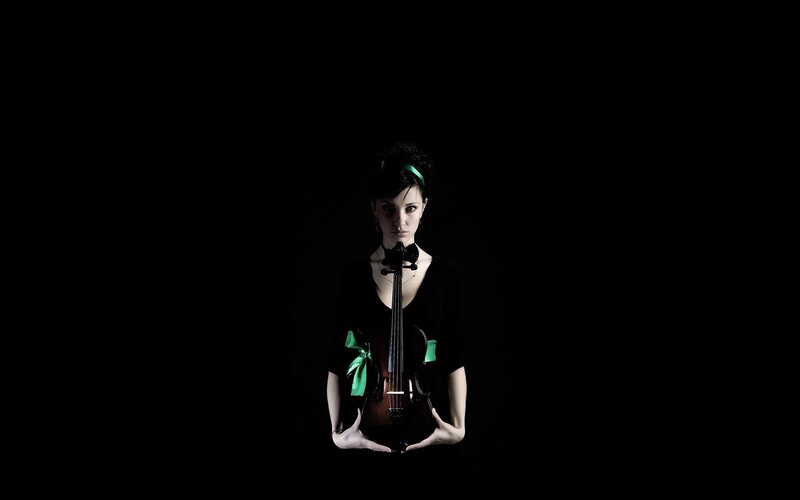 woman holding a violin