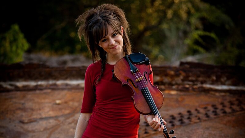 woman holding a violin