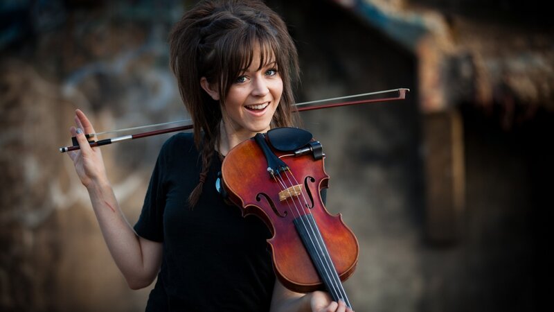 woman holding a violin