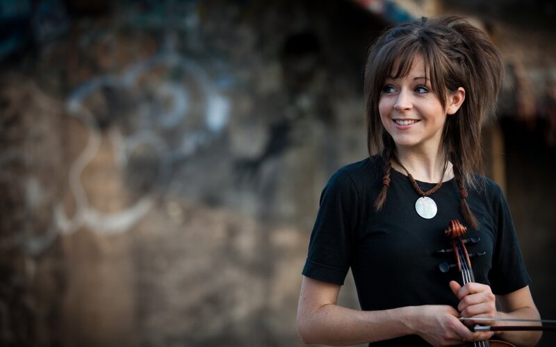 woman holding a violin