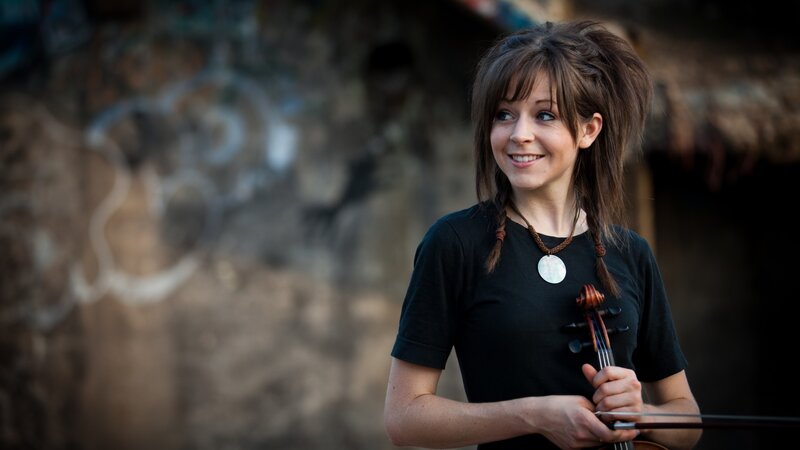 woman holding a violin