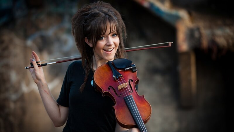 woman holding a violin