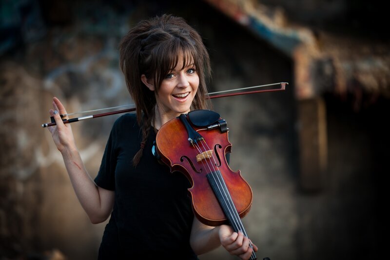 woman holding a violin