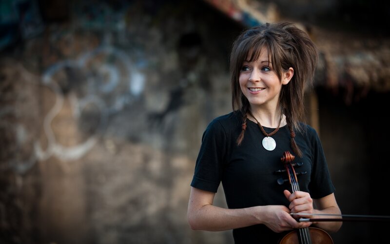 woman holding a violin