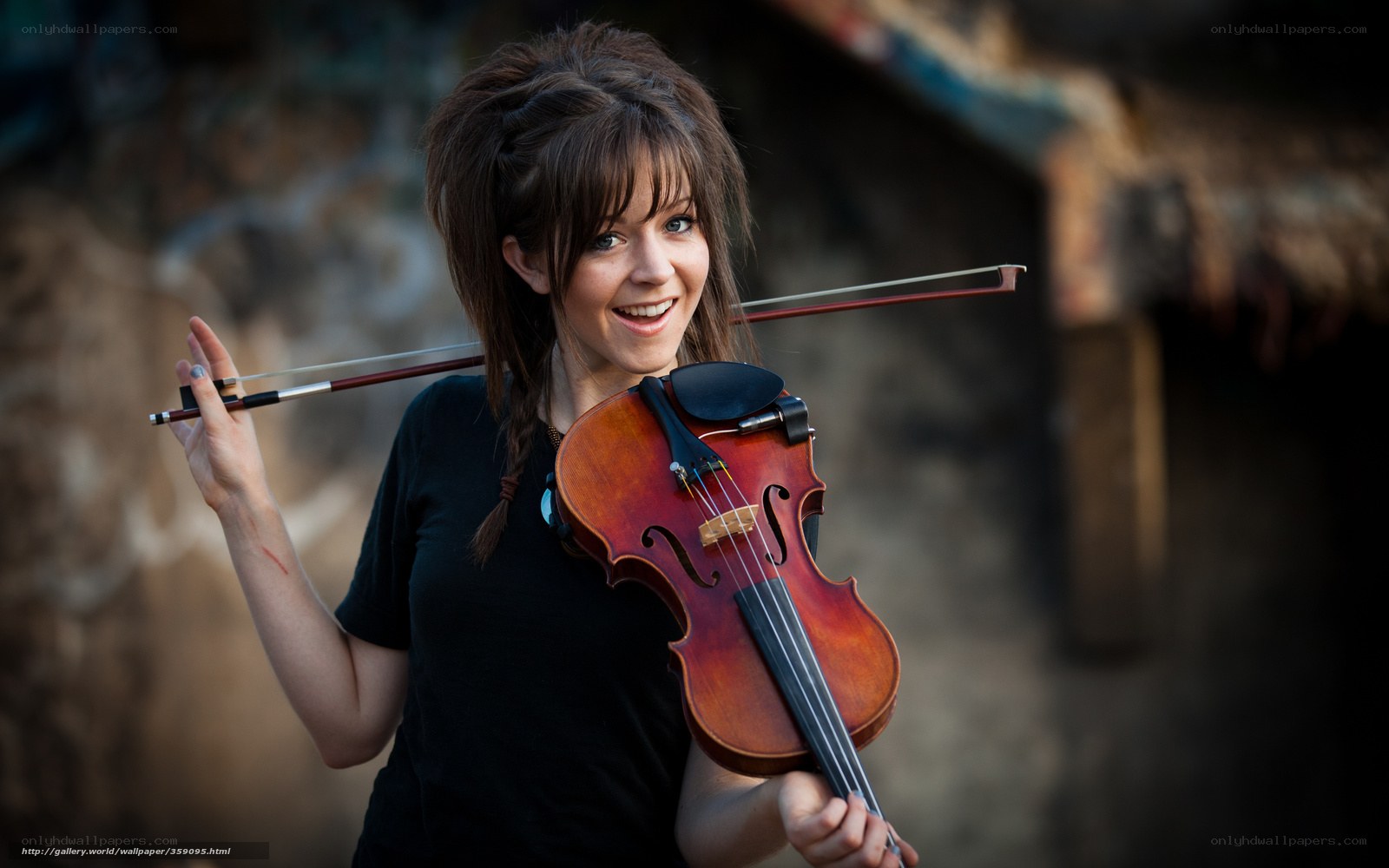 woman holding a violin