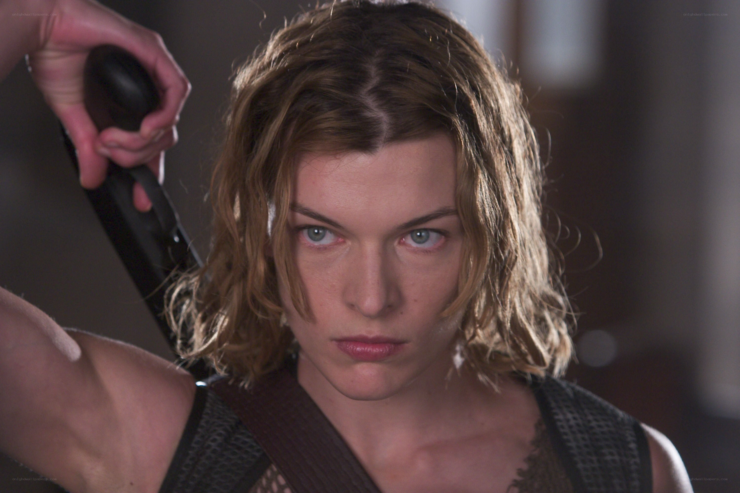 Woman holding a weapon