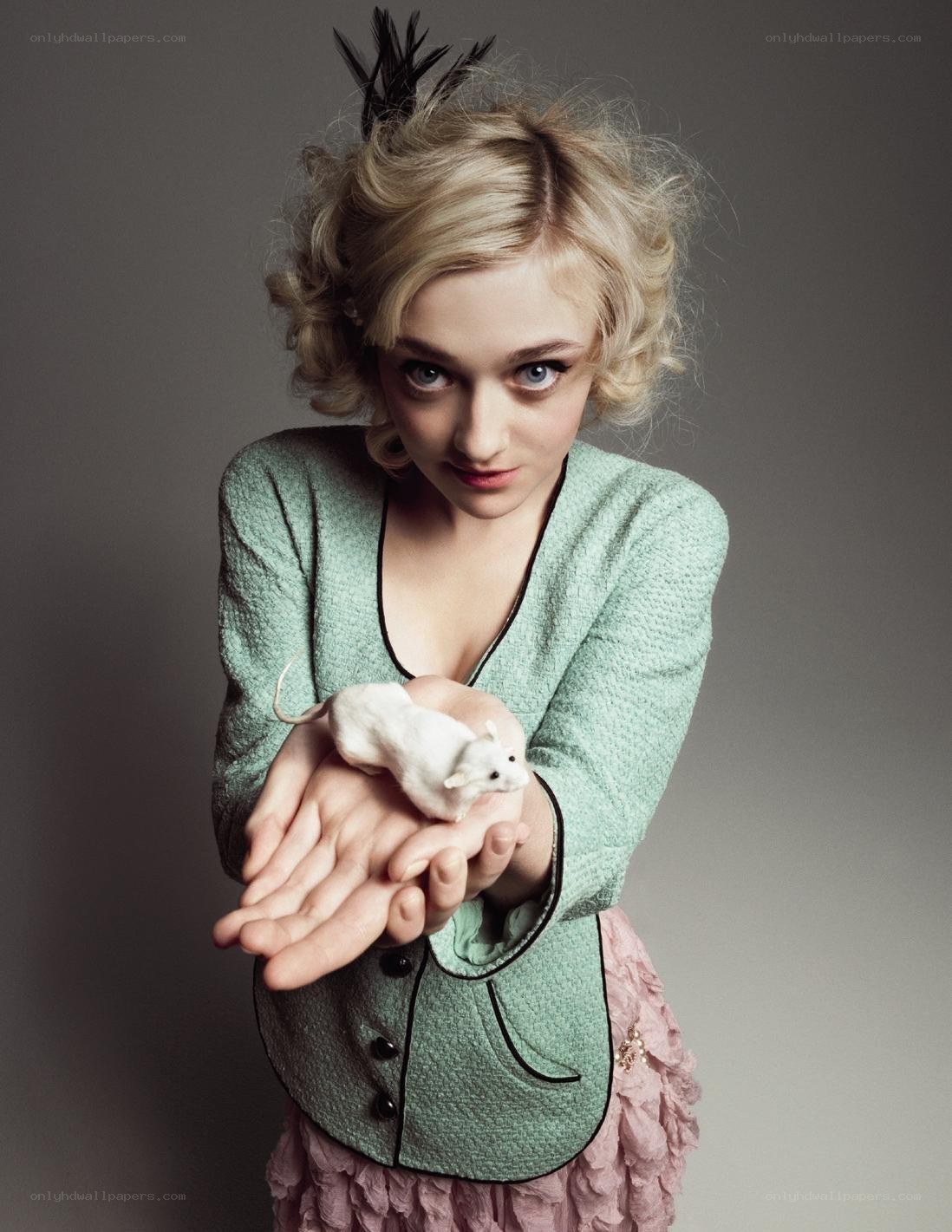 Woman holding a white mouse