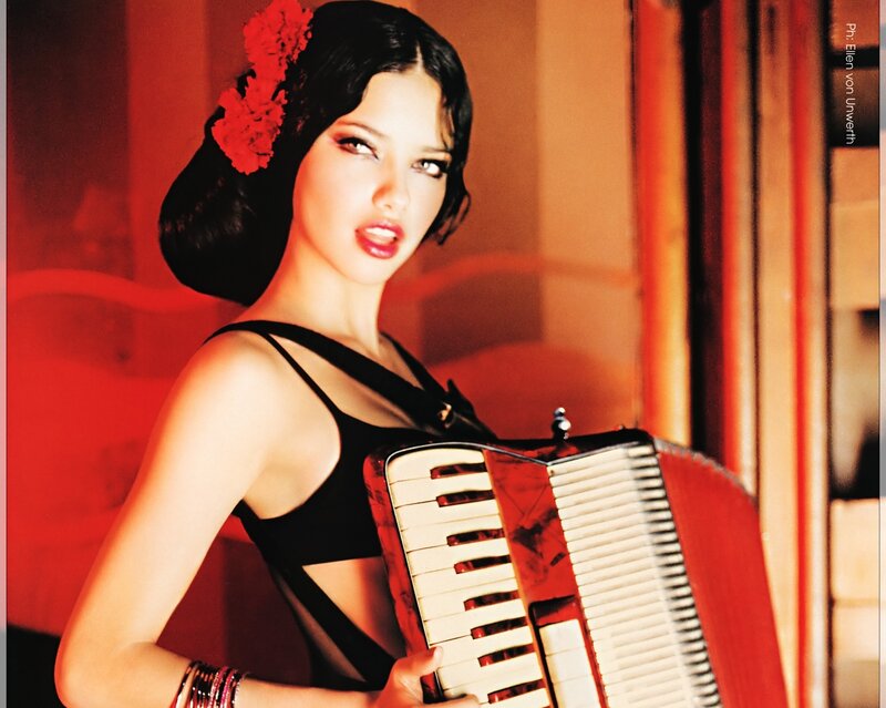 Woman Holding Accordion