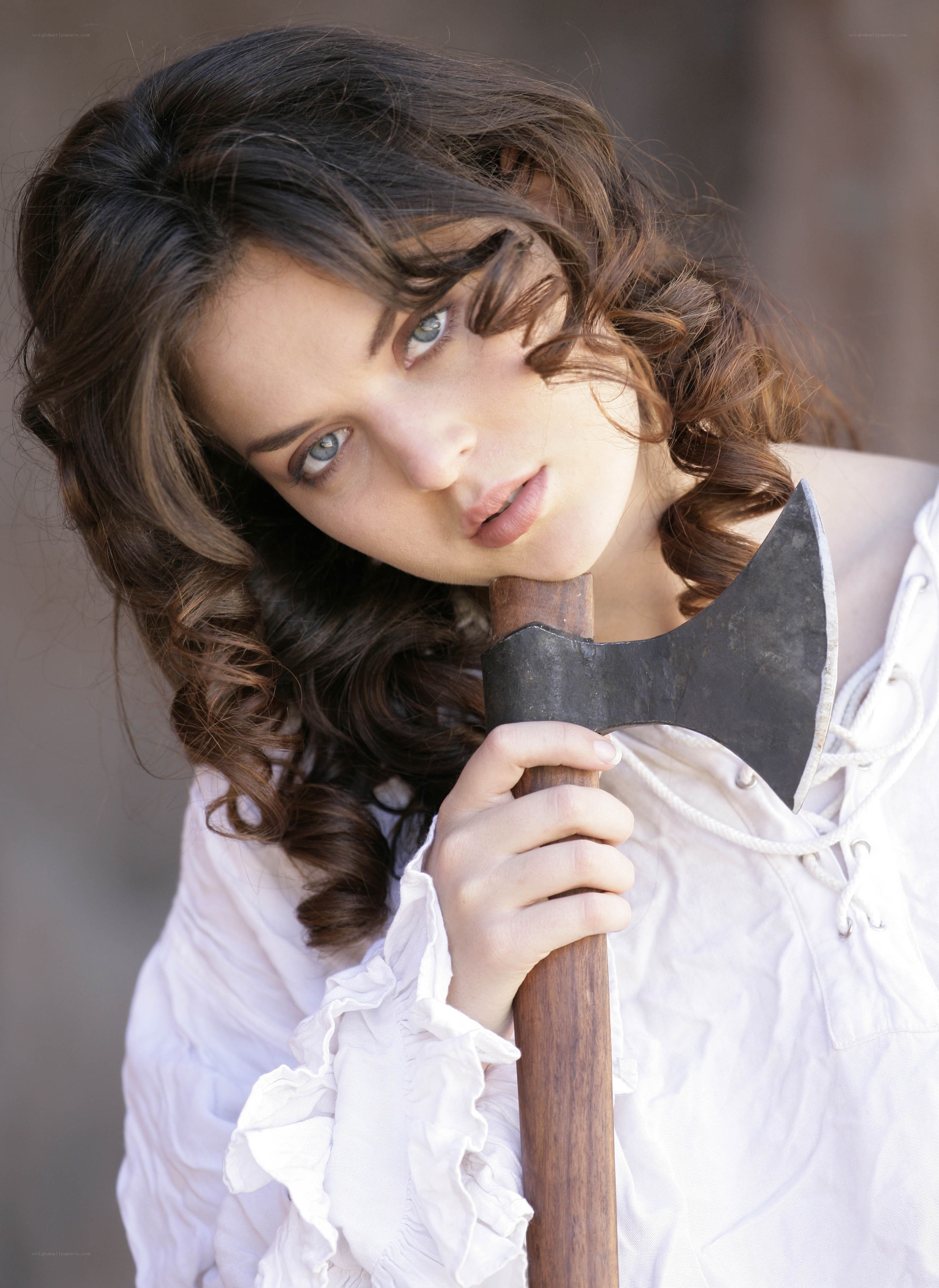 woman holding an axe
