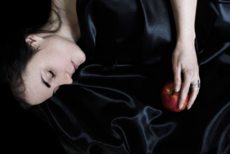 Woman Holding Apple — Black, Dramatic, Photograph, Ring