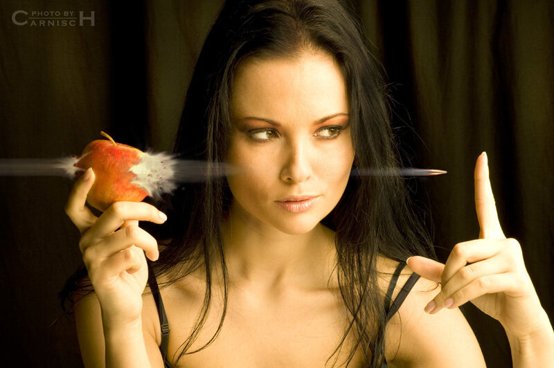 Woman Holding Apple — Black, Dramatic, Photograph