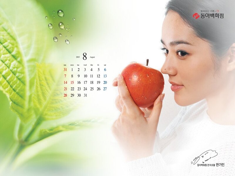 woman holding apple calendar